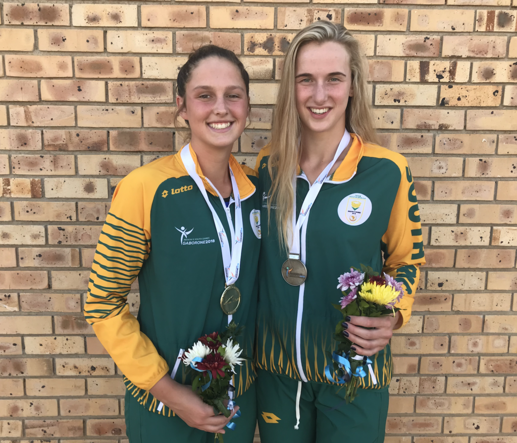 Olivia Nel poses with South African teammate.